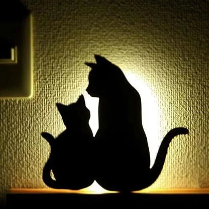 A stylish cat-themed LED lamp that automatically lights up when it detects sound, creating a cozy, ambient glow in a room.