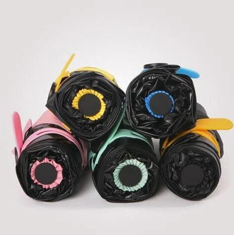 Compact, foldable umbrella in various colours offering premium weather protection and UV shielding