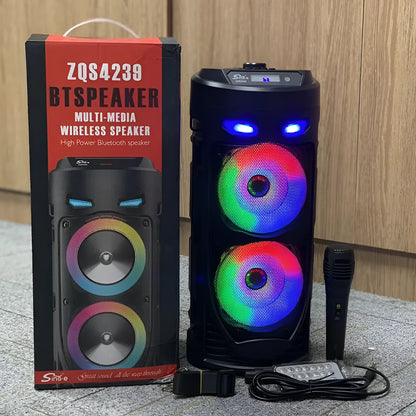 Black portable Bluetooth speaker with dual horn cannon design and wheat-coloured elements