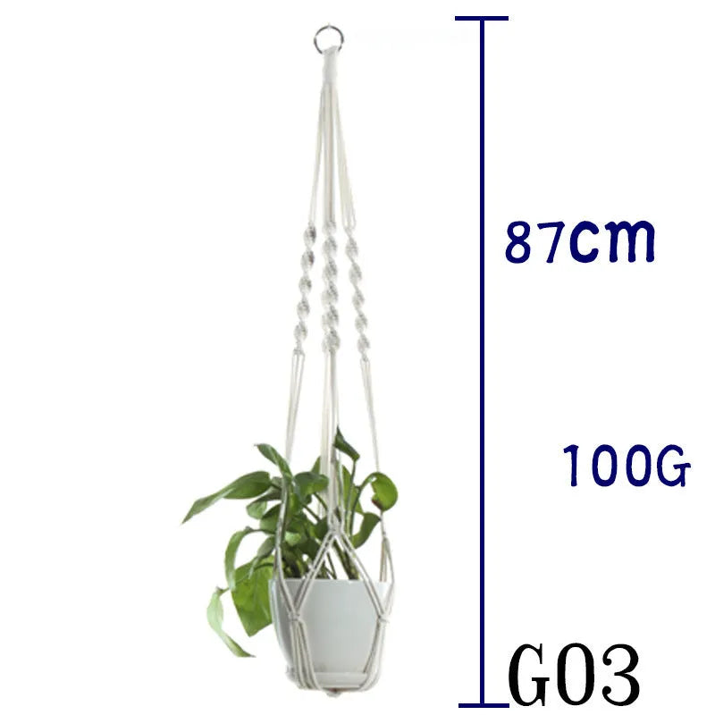 Handmade beige cotton rope net bag holding a plant pot, showing its textured sling design.