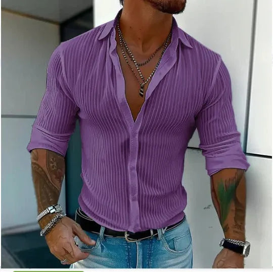 Man wearing a loose fit plain colour striped long sleeve cardigan shirt.