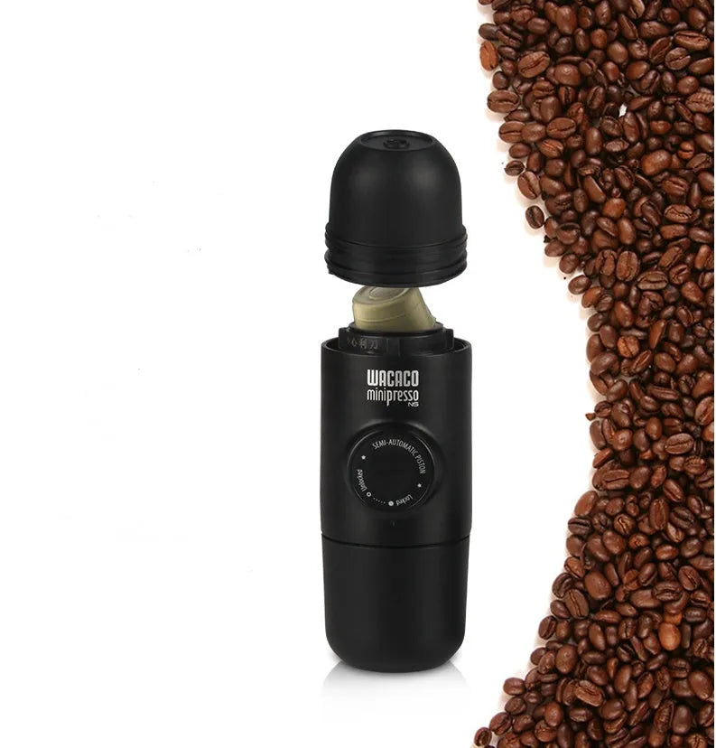 Black portable manual espresso machine with compact 6cm width, showing stainless steel components and manual pump for 8-bar pressure.