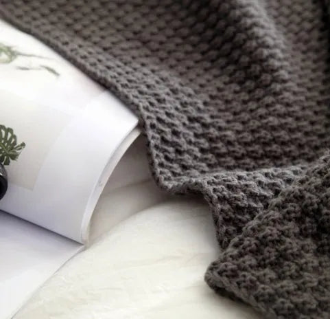 Nordic fringed knit ball acrylic blanket in beige colour measuring 130×170cm