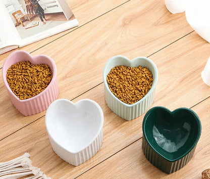 Elevated ceramic pet bowl with tilted design for comfortable and healthy feeding