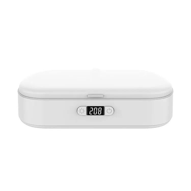 White wireless UV steriliser and charging box for mobile phones and small personal items.