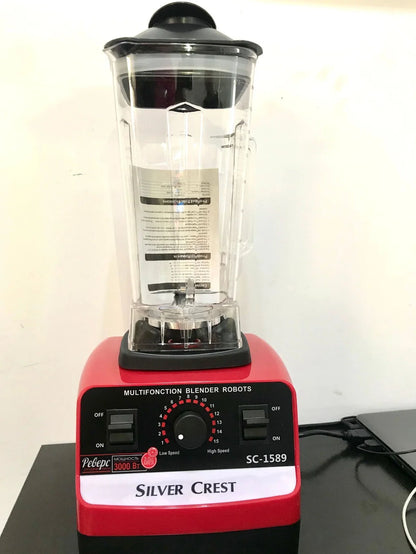 Red multifunctional juicer blender with 3000W motor, container, and base for kitchen food processing
