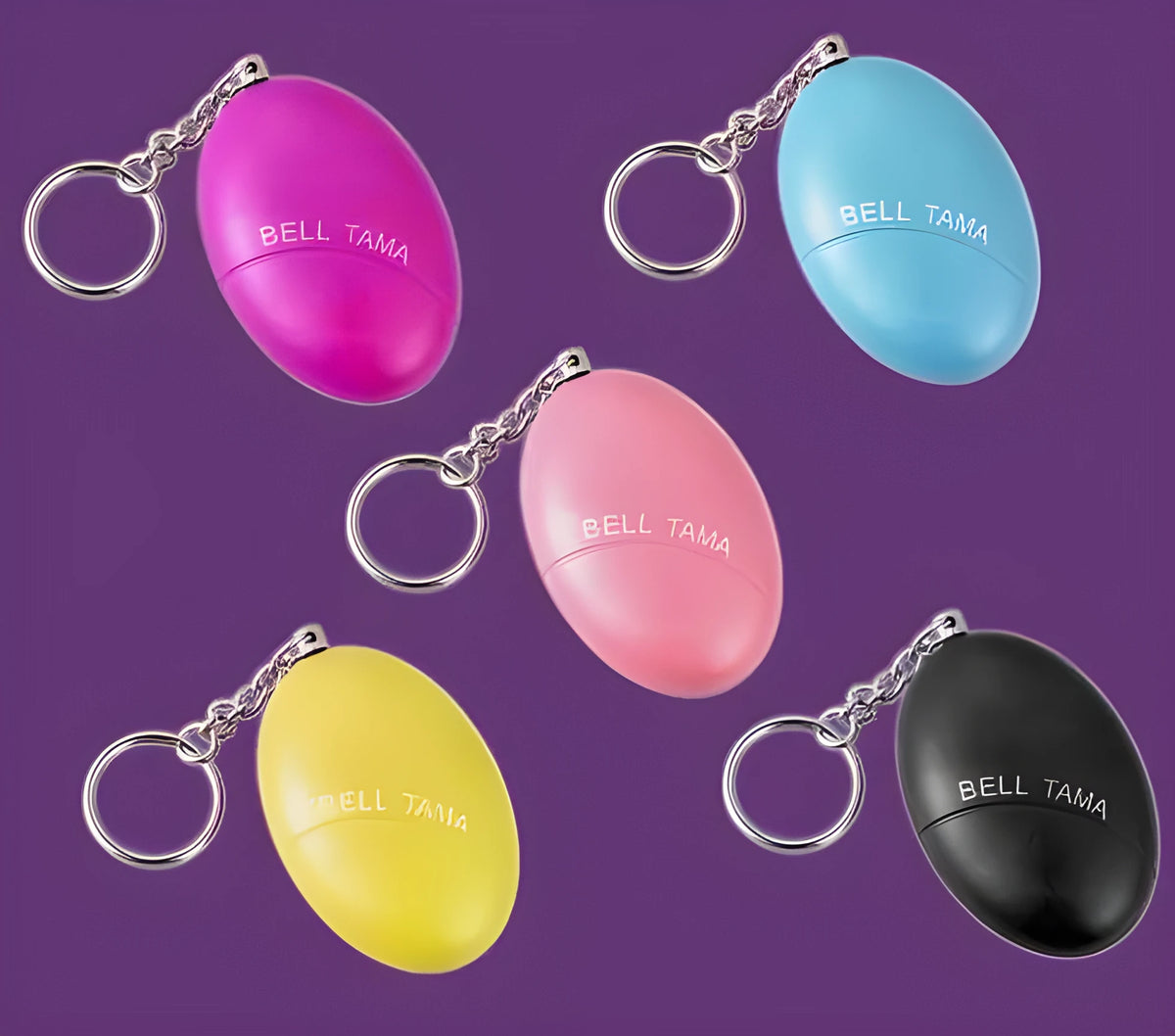 Compact black personal alarm keychain with pull-ring for loud siren activation, shown next to a ruler showing 6cm length.