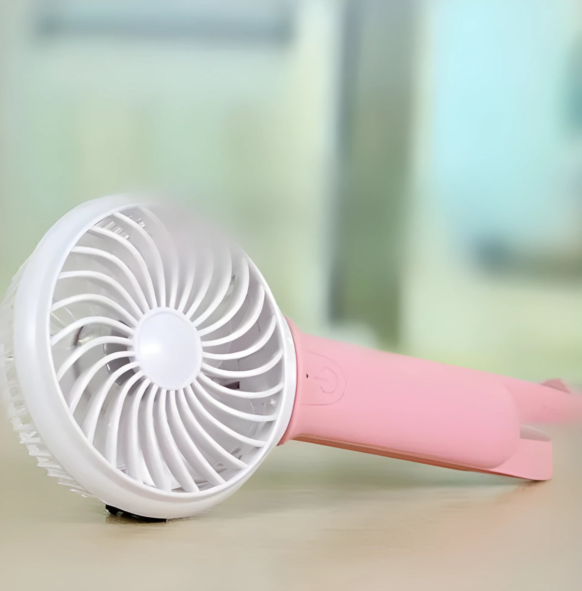 Blue coloured USB rechargeable hand-held fan with LED light, showing 200mm blades and compact size.