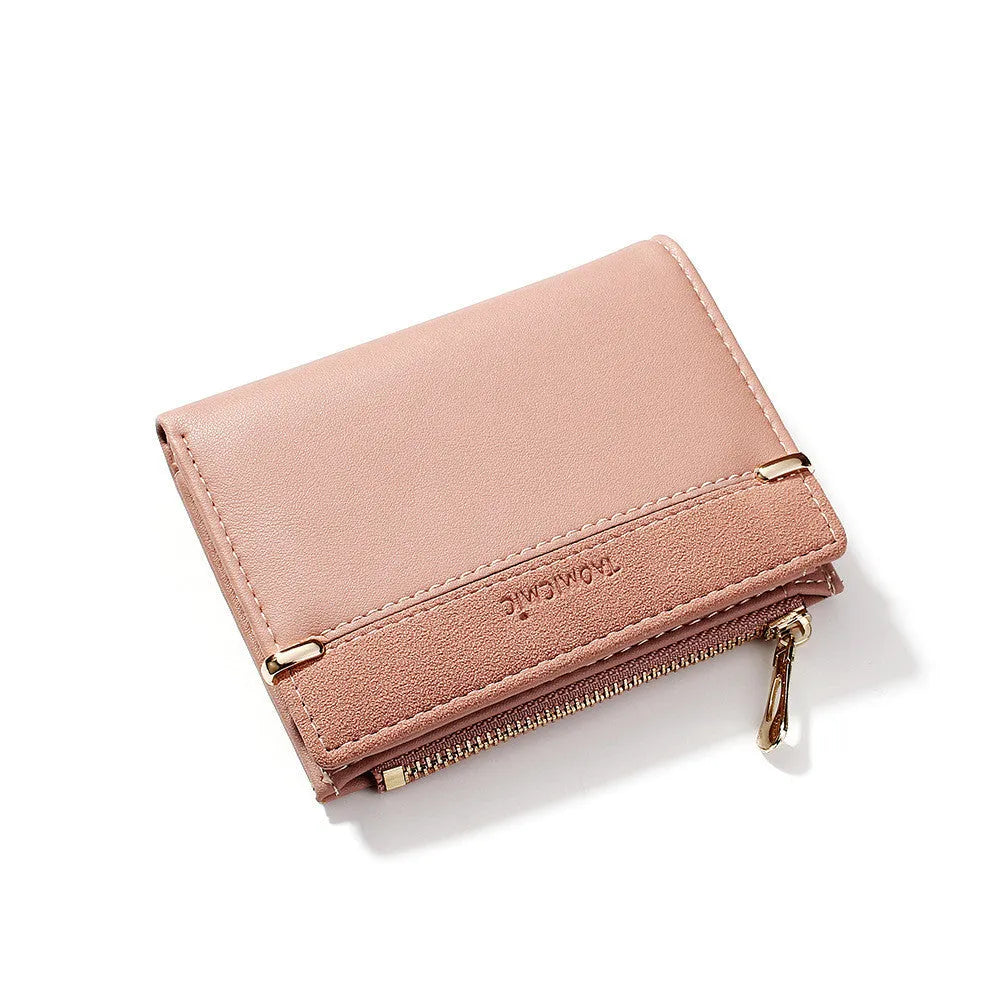 Multi card slot short zipper ladies wallet in 2-fold design with PU leather exterior showing internal compartments