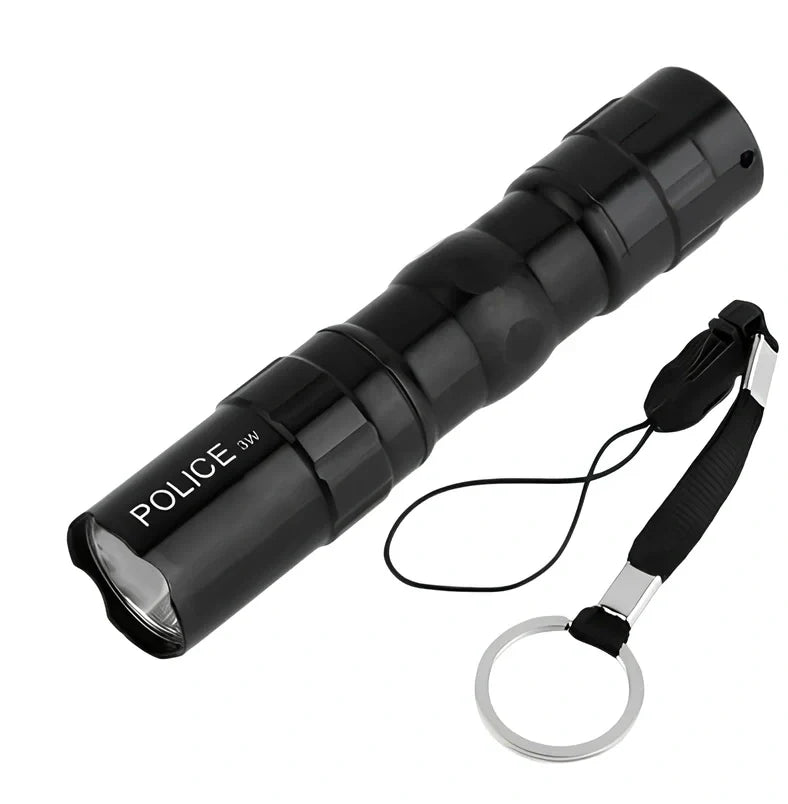 Black aluminium LED mini flashlight measuring 9.5cm with 3W bulb and AA battery compartment