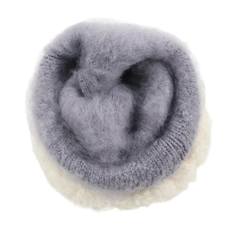 Cosy knitted gloves in a variety of classic winter colours, perfect for staying warm and stylish during the British cold season.