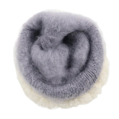 Cosy knitted gloves in a variety of classic winter colours, perfect for staying warm and stylish during the British cold season.