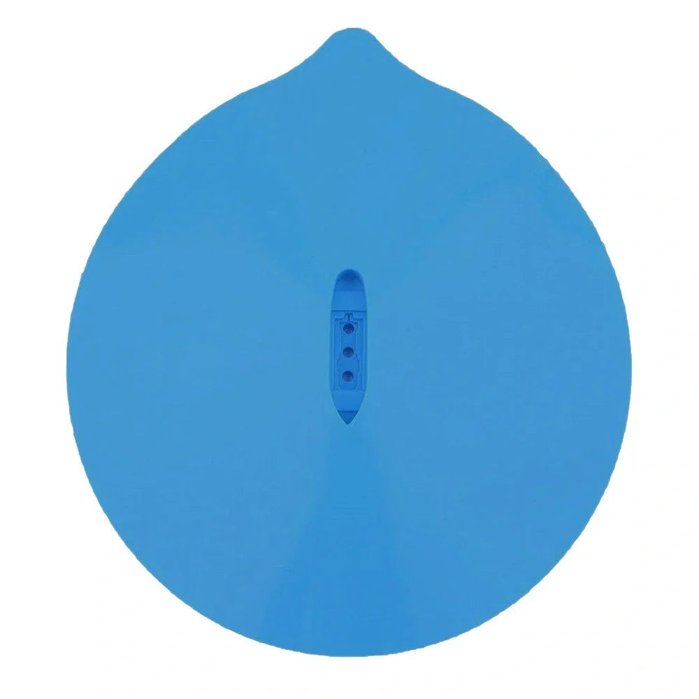 Blue silicone steamer lid on kitchen bowl showing airtight seal and flexible edges