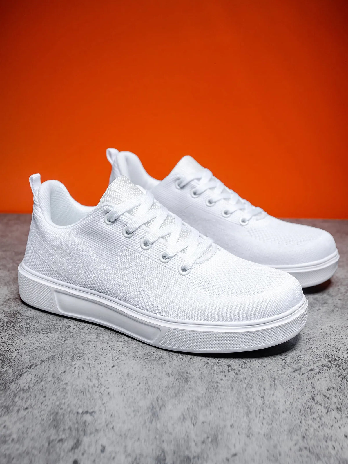Light white and black unisex casual sports shoes with thick EVA sole and mesh upper, front lace-up.