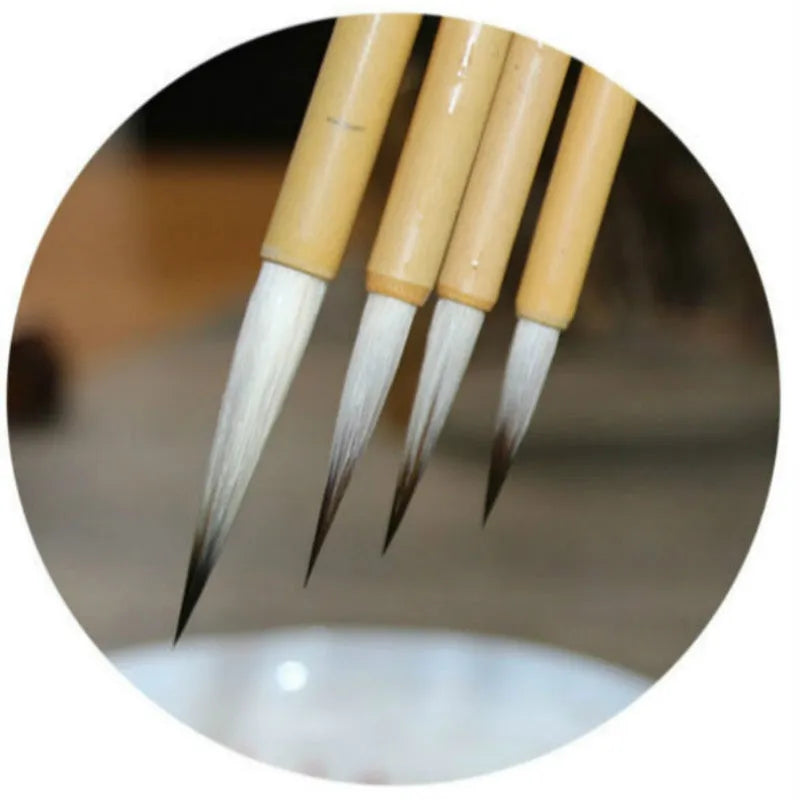 Wolf wool writing brush set with lower case thin gold body construction, traditional hook thread design, four pieces per set in pine branch colour variant, mixed and multiple hair materials for calligraphy and art work