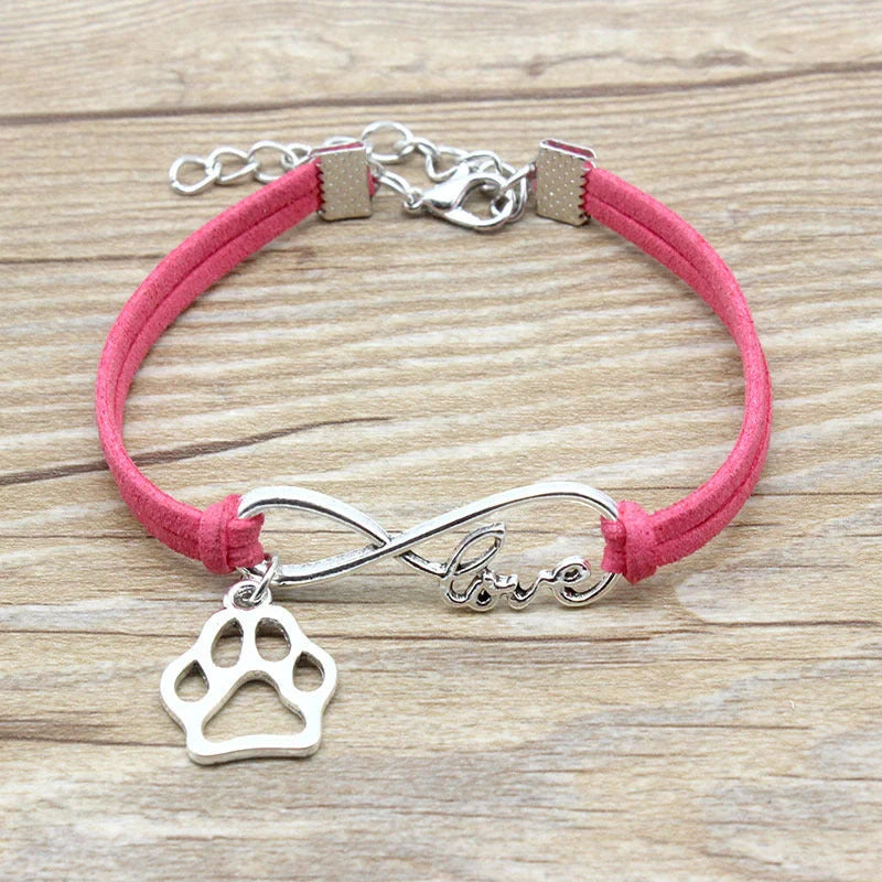 Stylish hand-woven infinite love pet bracelet in various colours, featuring a bow design and made of premium alloy materials