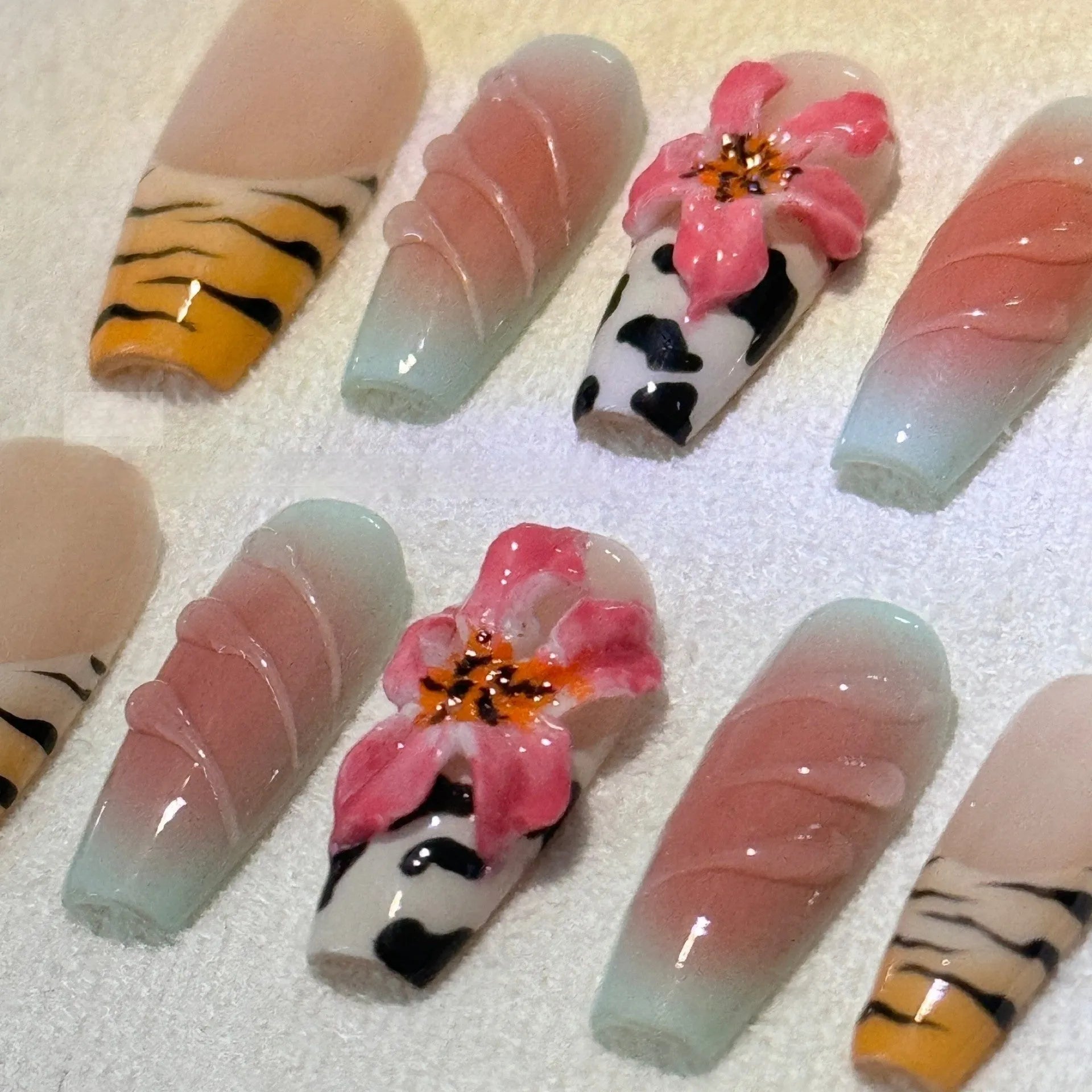 Zebra pattern lily hand carving artificial nails with embossed leopard print design
