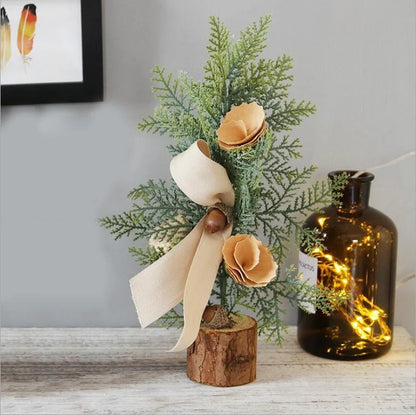 Mini artificial Christmas tree with red berries and snow flocking, 25cm