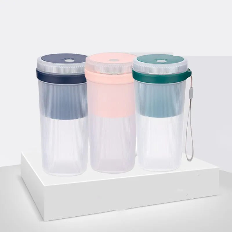 Multi-function portable blender in blue, green, or pink with USB cable and detachable parts for juicing