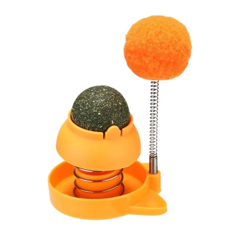 Blue, orange, and pink 55mm lickable mint ball cat toy for dental care and boredom relief.
