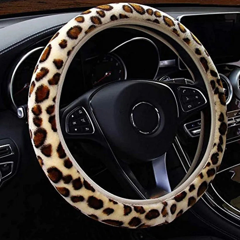 Short plush steering wheel cover in one of seven colours, fitting a 38cm steering wheel with non-slip grip
