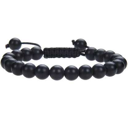 Women's flat knot braided healing bracelet hand-woven with natural gemstone beads in geometric pattern