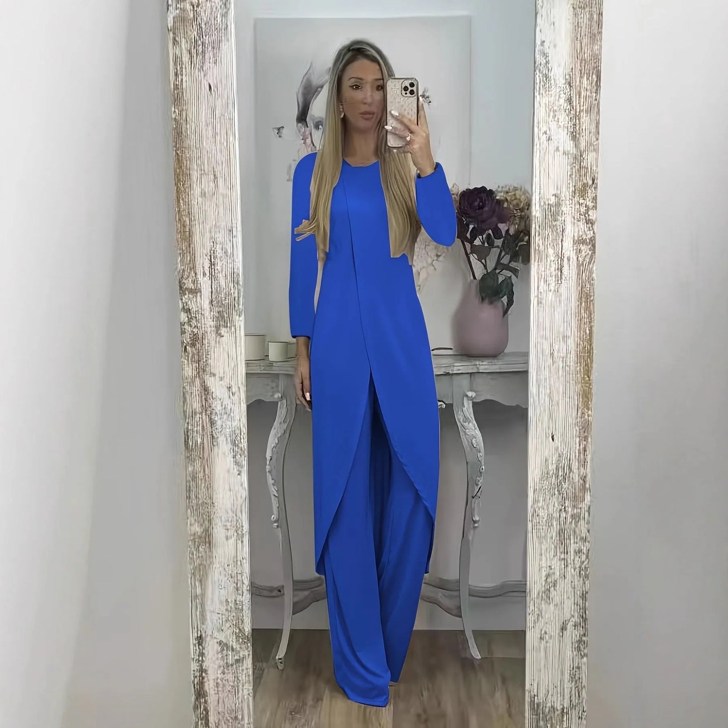 Black loose-fit polyester two-piece lounge set with long sleeves and matching trousers