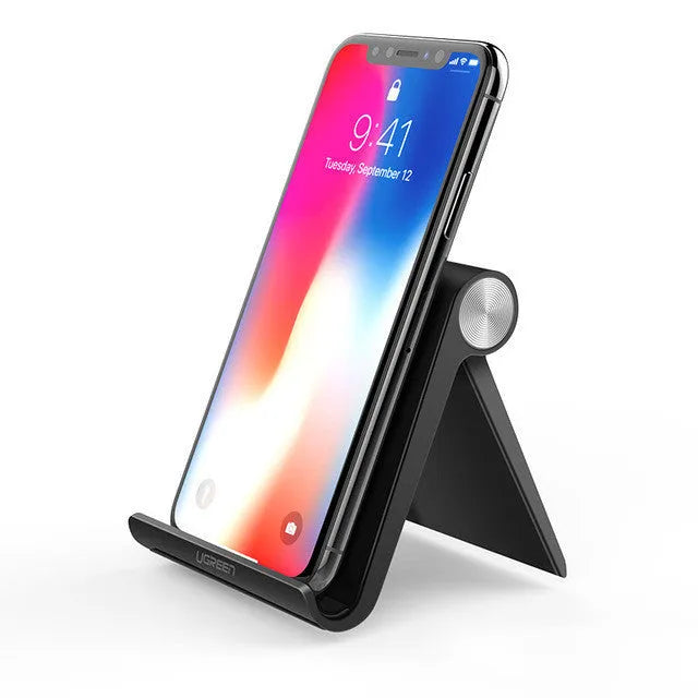 UGREEN LP106 adjustable lazy bracket phone holder in black, blue, or white, gripping a smartphone.