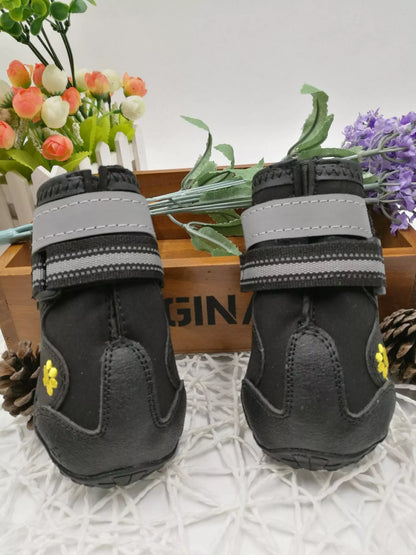 Black waterproof dog shoes with non-slip soles and adjustable fuzzy belt