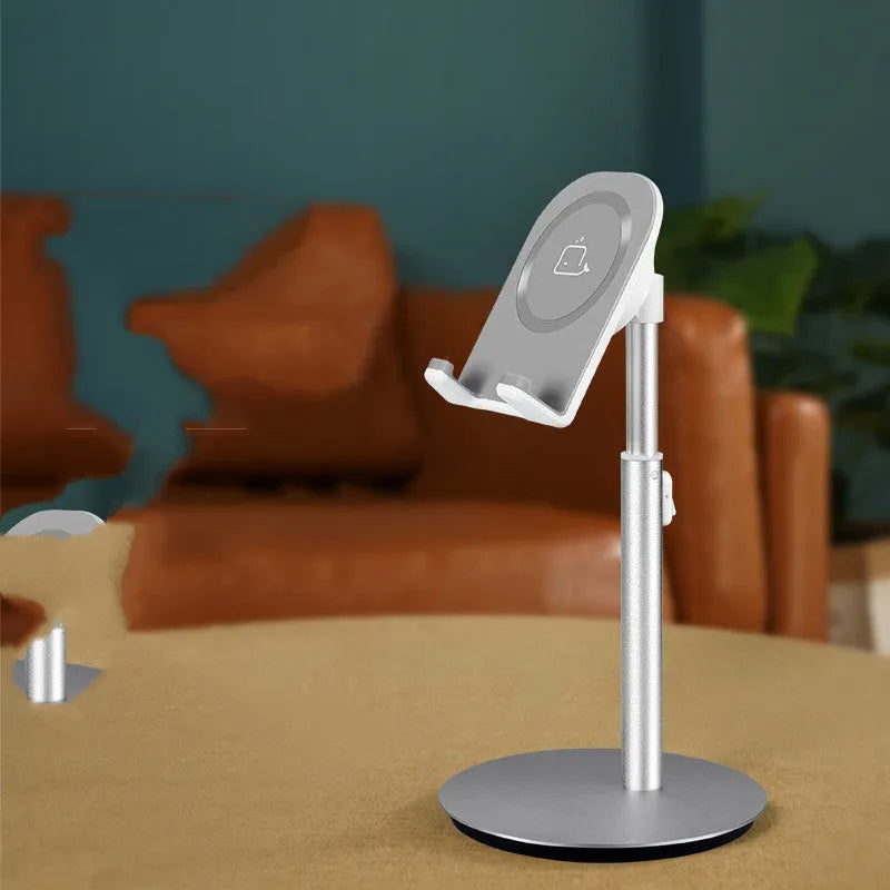 Silver metal desktop stand holding tablet and phone for hands-free viewing