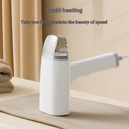 Blue handheld garment steamer with water tank, measuring 196mm long, on white background