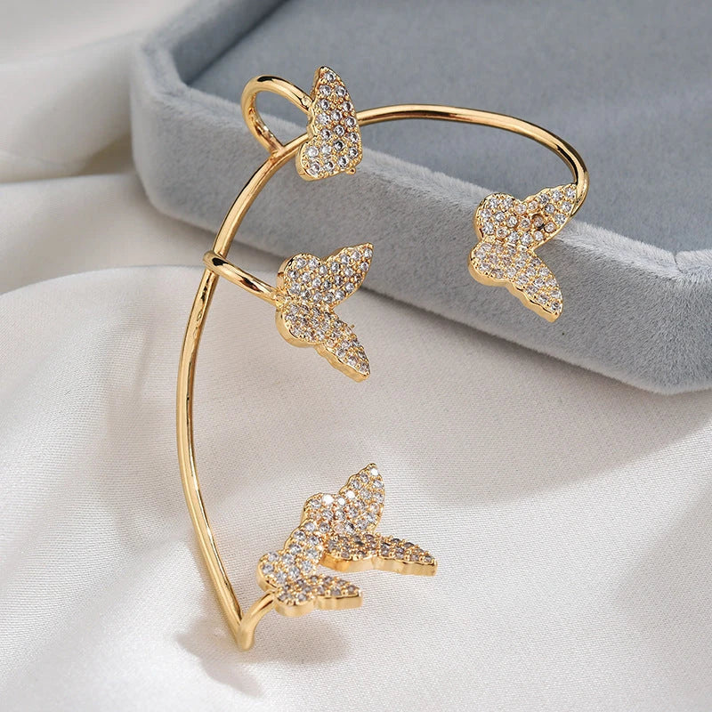 Elegant gold-plated butterfly ear cuffs with sparkling zircon accents, perfect for women's fashion and accessorizing