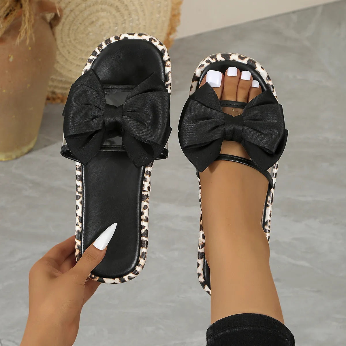 Women's leopard print thick sole beach slippers with round toe and PU upper in black and white options