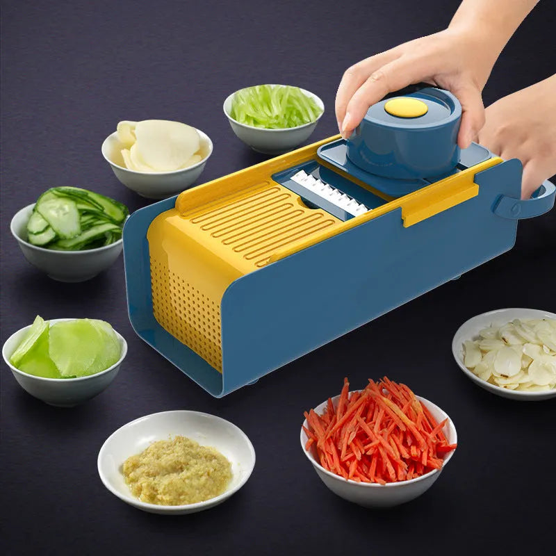 Hand-push kitchen grater with four stainless steel blades and milling attachment on white background