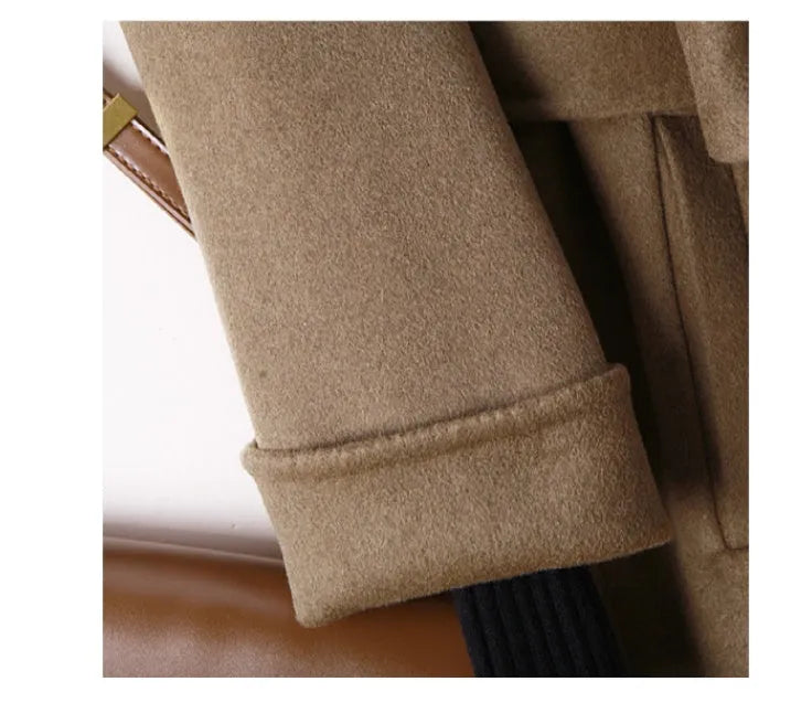 Long grey wool coat with suit collar shown in black and caramel colours on a male model