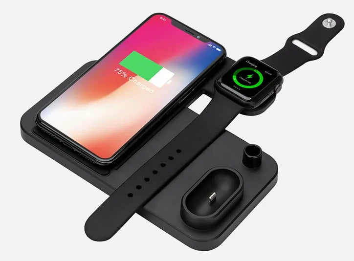 4-in-1 wireless charging station with adjustable magnetic stand charging phone, watch, earbuds, and stylus on a desk