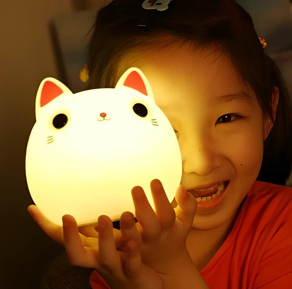 White silicone cat LED lamp with warm glow, measuring 12.5cm tall with USB charging port