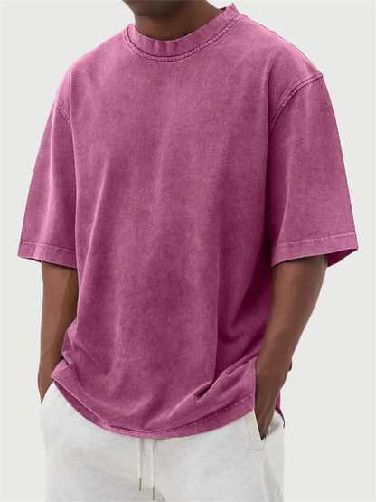 Men's loose fit stone-washed distressed short sleeve t-shirt in solid colour