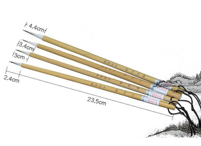Four traditional writing brushes with gold bodies, wolf wool hair, and pine branch colour
