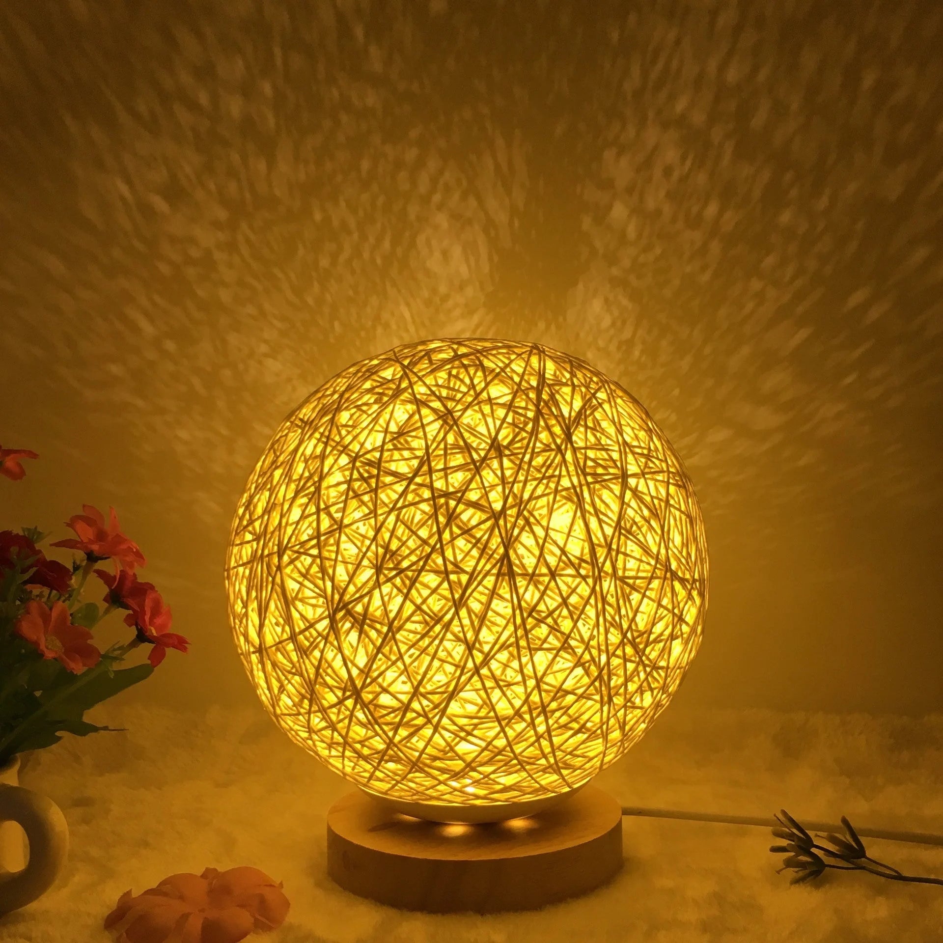 LED rattan table lamp with hand-knit linen shade in various colours