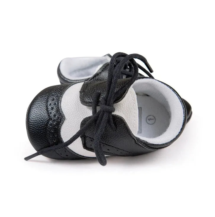 Men's vintage soft-soled baby shoes in synthetic leather, shown in light brown colour