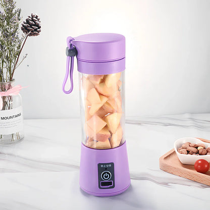 Portable USB rechargeable blender in blue with stainless steel blades, measuring 20 cm tall, for making smoothies.