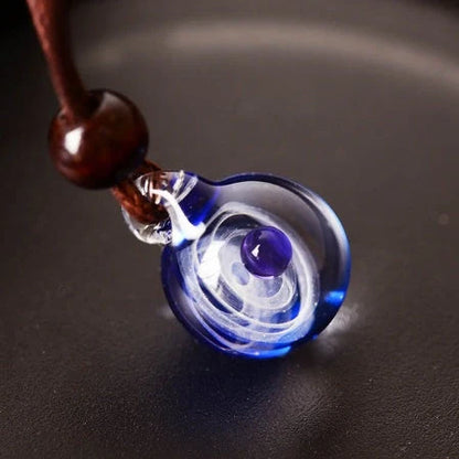 Cosmic Nebula Pendant Necklace featuring a unique blue starry sky design