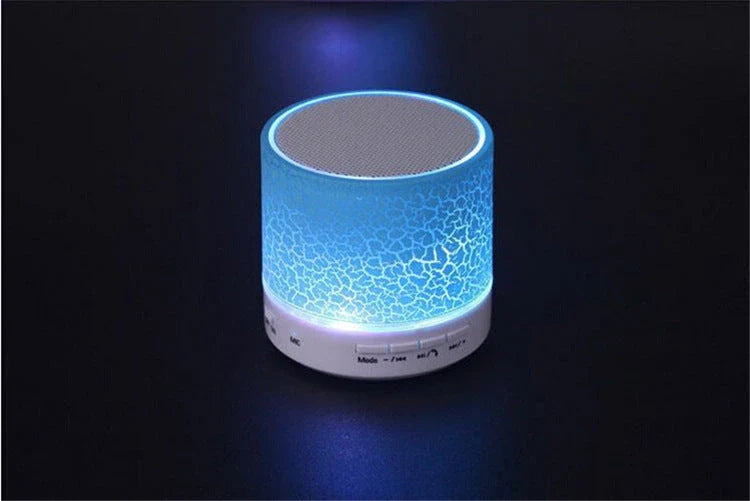 Compact wireless Bluetooth speakers in various colours, featuring premium audio components and sleek, durable design