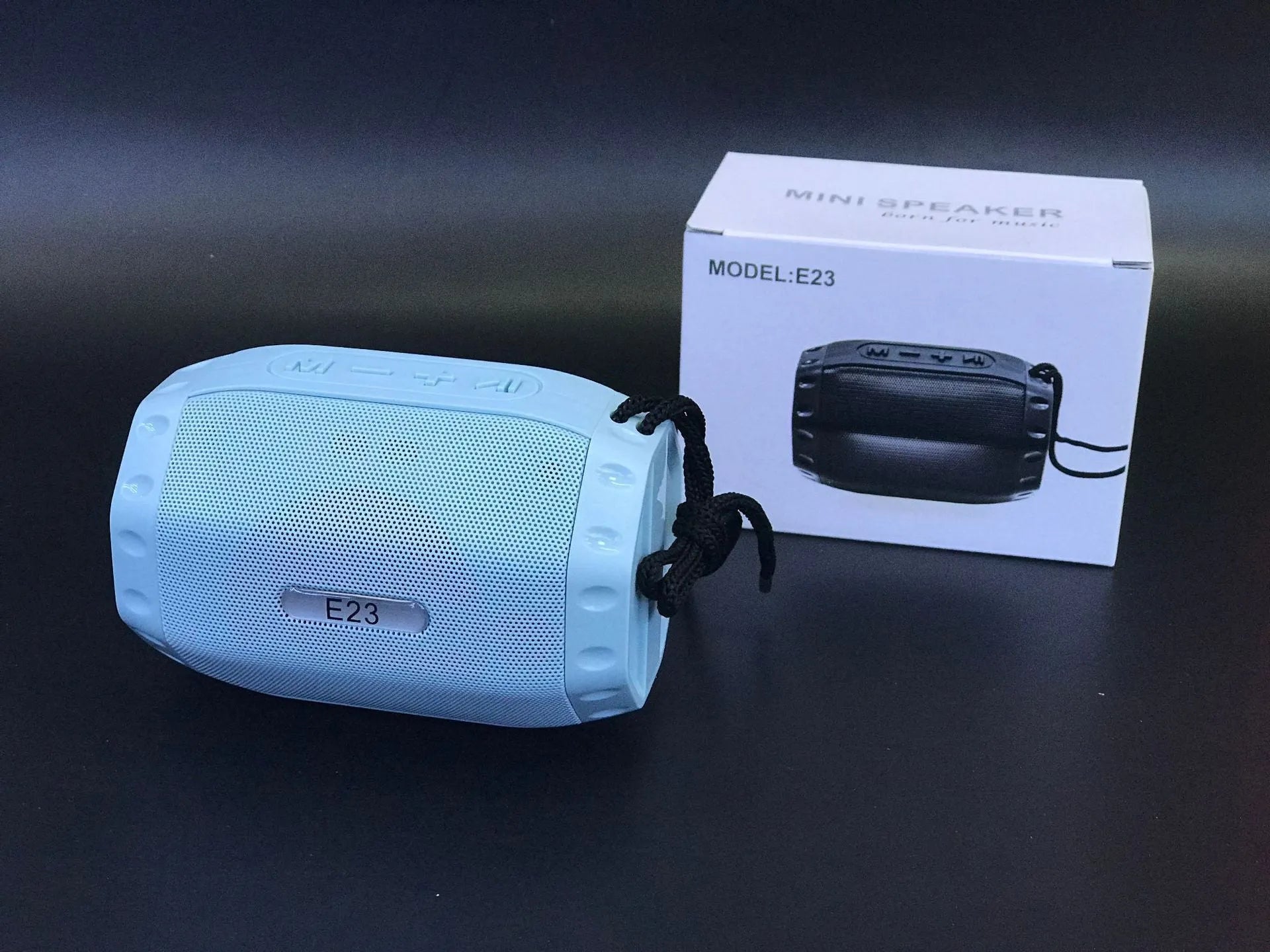 Wireless USB card Bluetooth speaker in four colour options showing compact design
