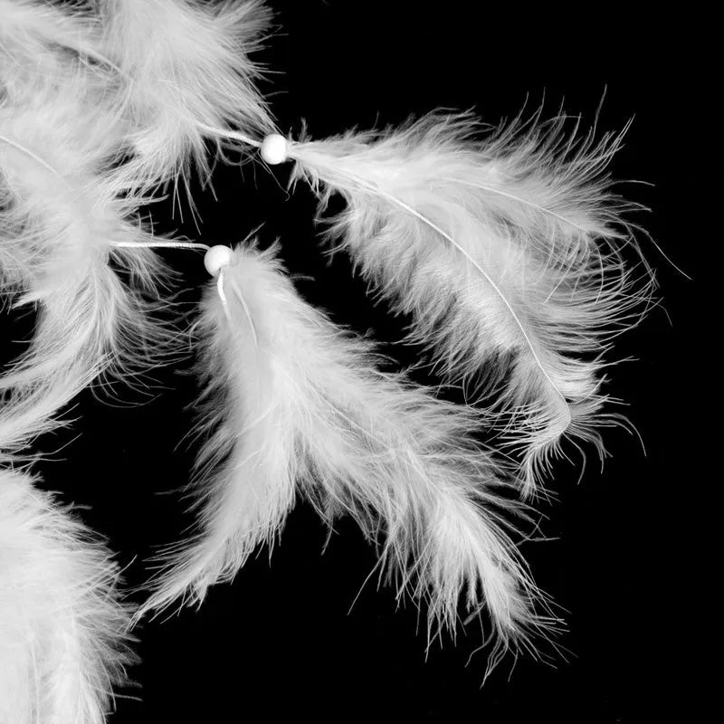 11cm long white European style decorative feathers for weddings and events.