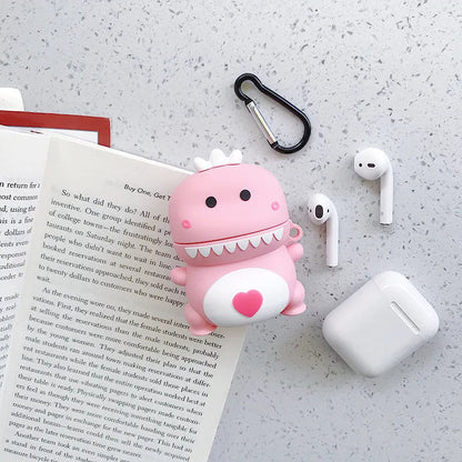 Green silicone AirPods case with raised cartoon animal design, showing charging port cutout.