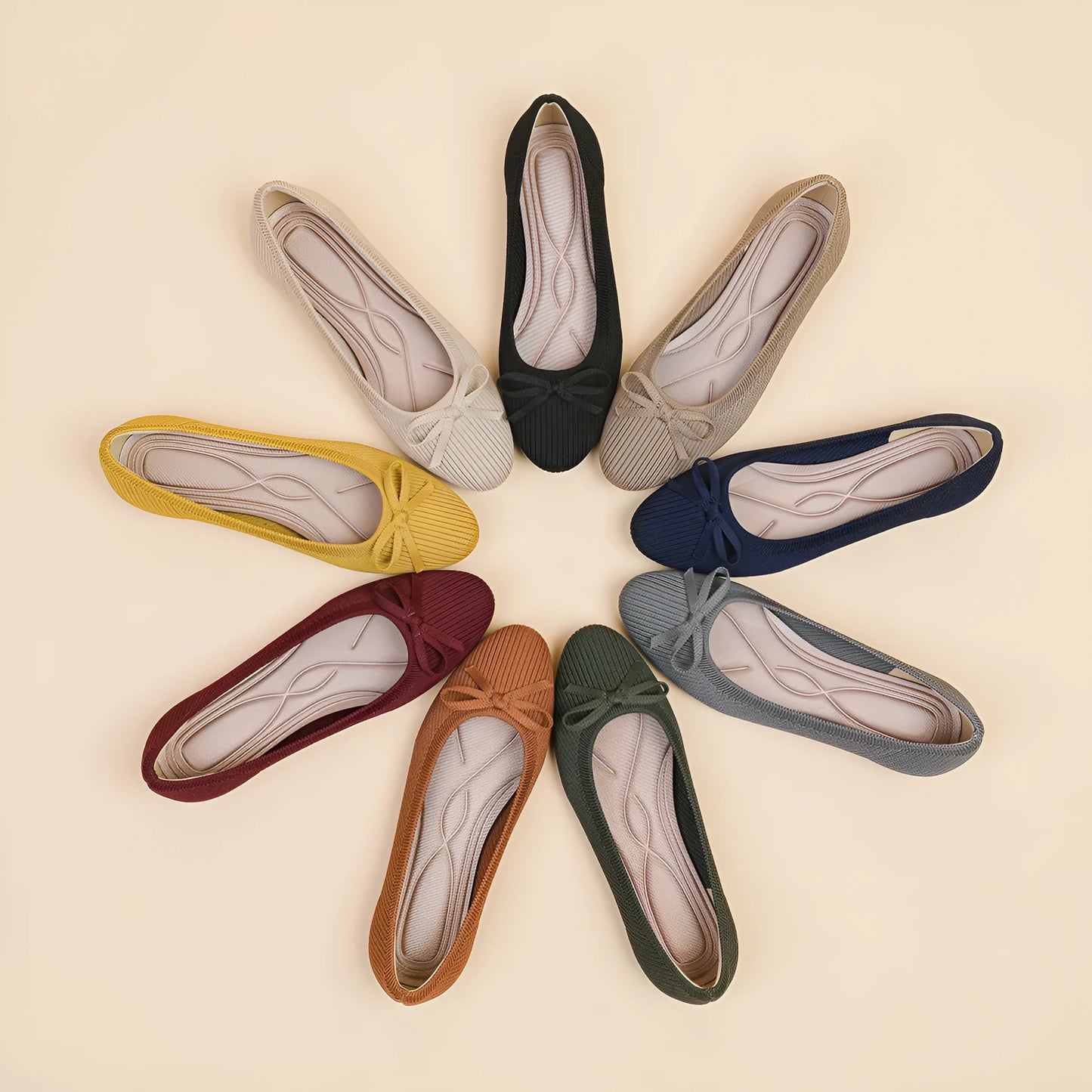 Women's round toe flat pumps with bow detail in butterfly colours showing fabric upper and shallow mouth opening