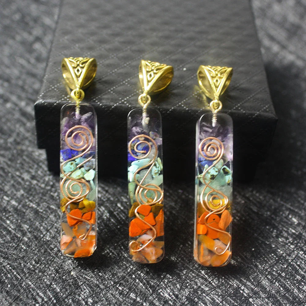 Handcrafted natural crystal seven chakra pendant with unique geometric design