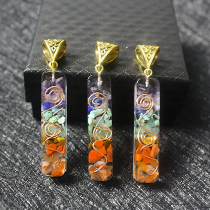 Handcrafted natural crystal seven chakra pendant with unique geometric design